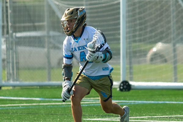 Corona del Mar’s Owen Majit (#4) sprinting behind the goal to gain another point for the Seakings.