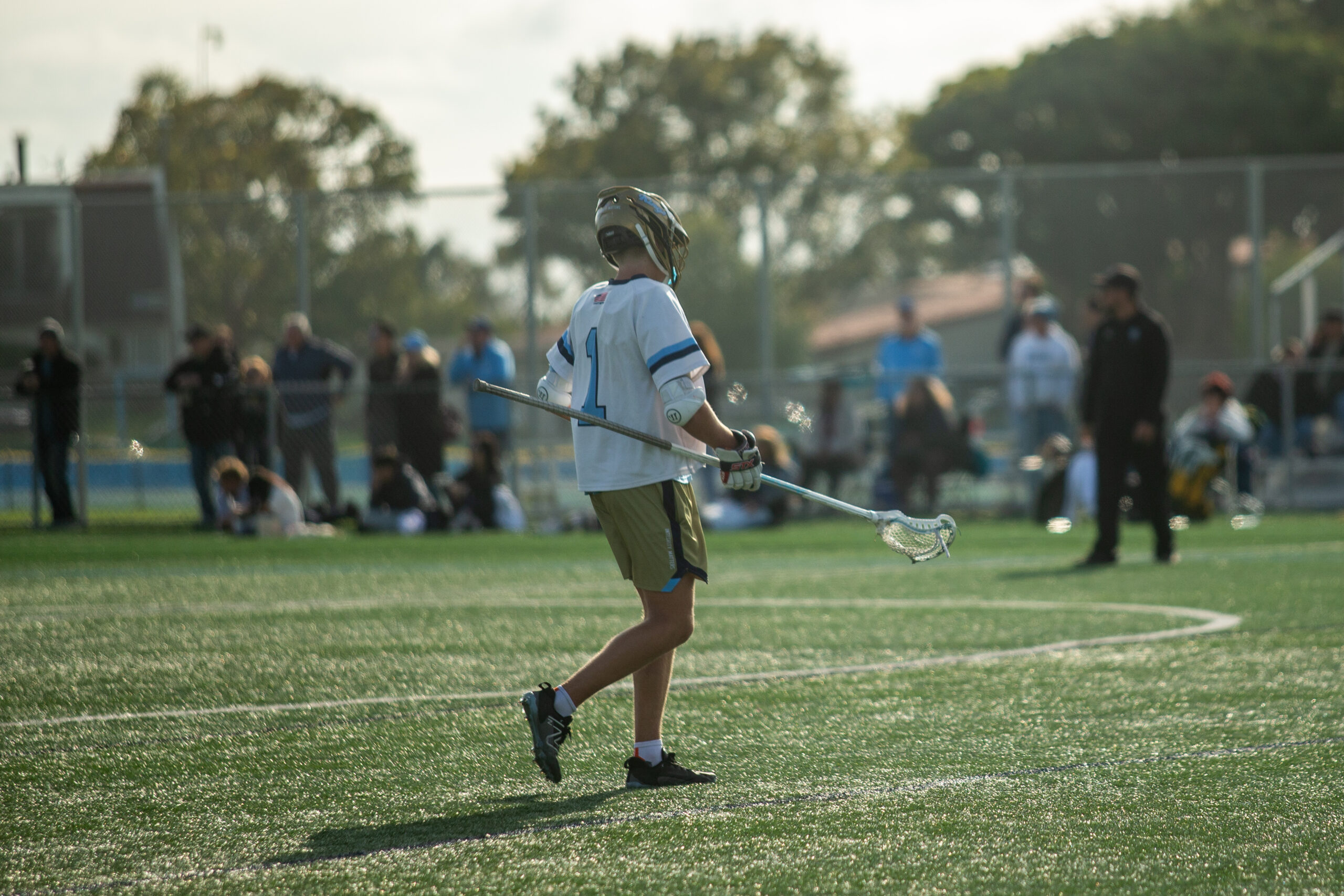 Corona del Mar’s Tucker Rosenberger (#1) heading out onto the field after halftime.