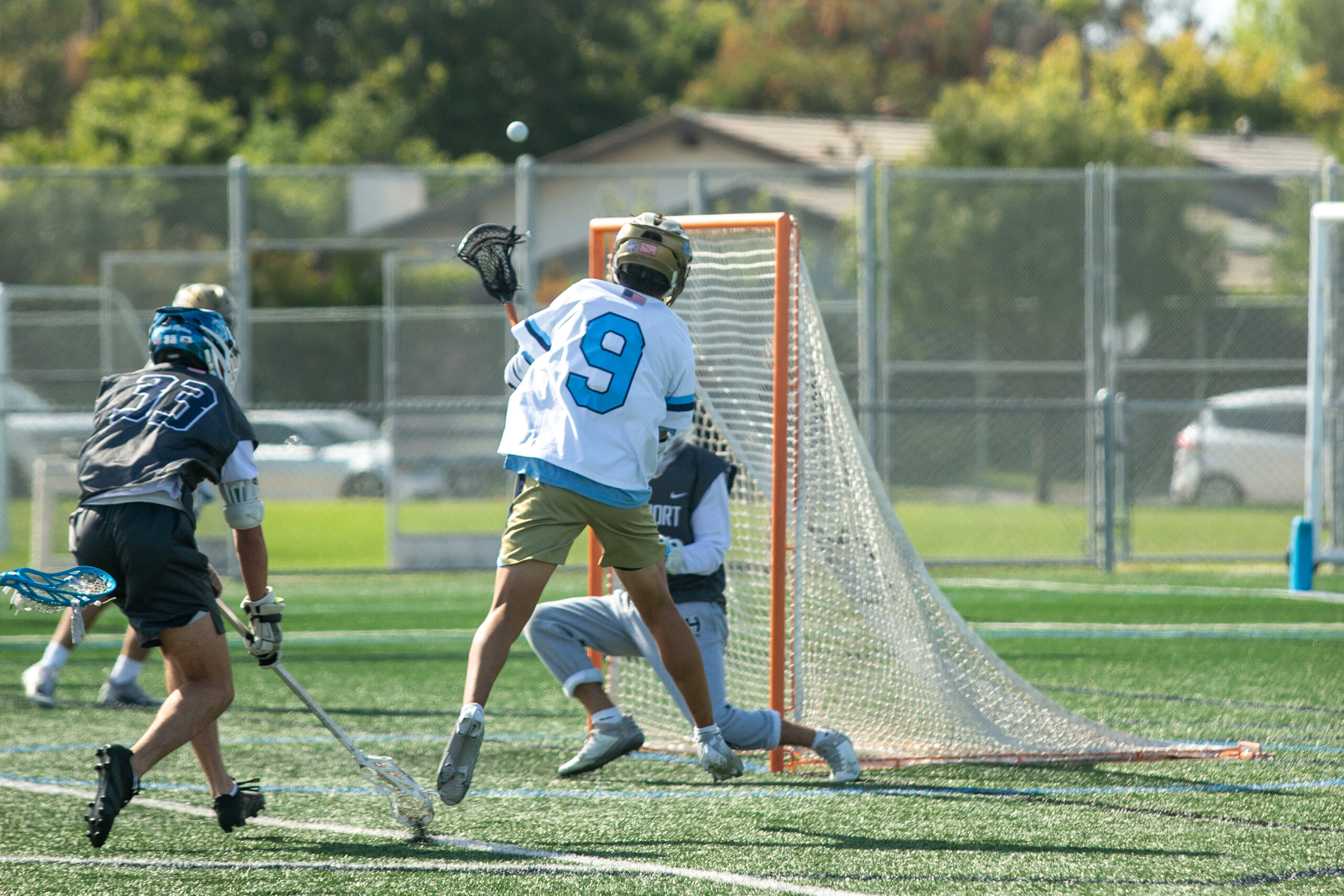 Corona del Mar’s Garrett Ip (#9) scoring another goal for the Seakings. Photos and Captions by Sam Pearsall.
